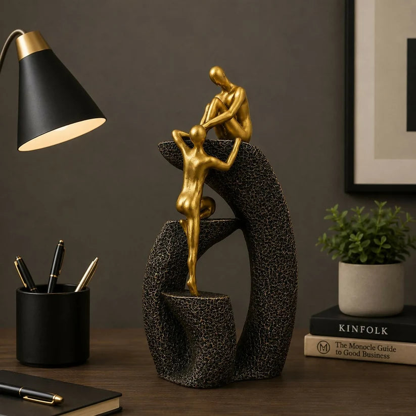 Bawaal Abstract Couple Climbing Resin Showpiece – Golden Love & Togetherness Decor ( any 1 color)