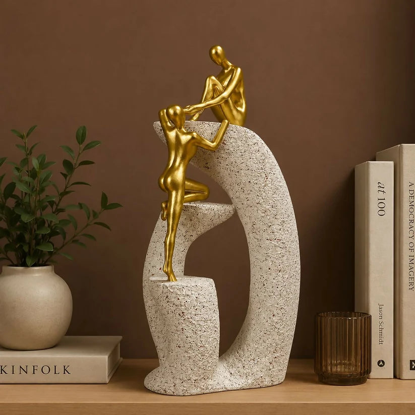Bawaal Abstract Couple Climbing Resin Showpiece – Golden Love & Togetherness Decor ( any 1 color)
